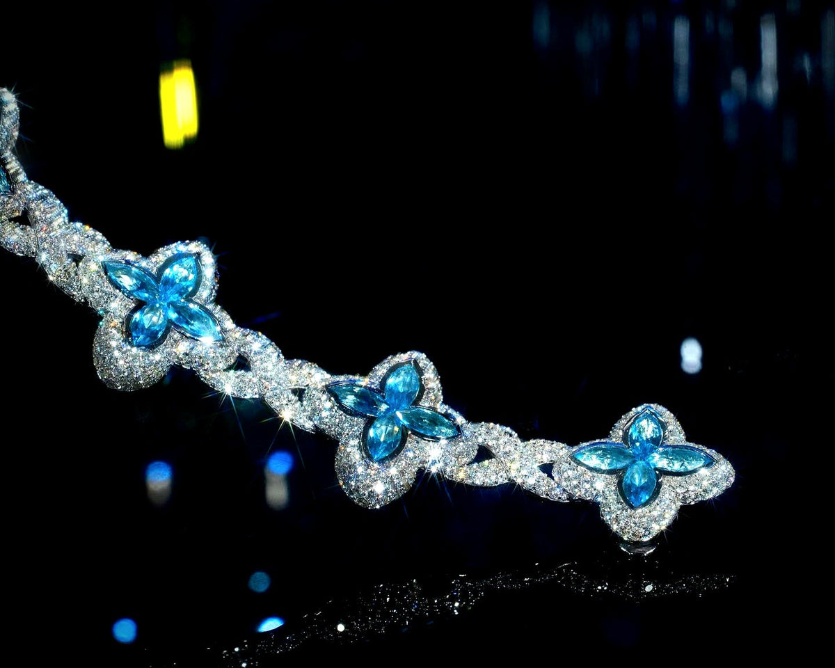 White Gold Clover Bracelet with Blue Marquise Gemstones and Pavé Diamonds