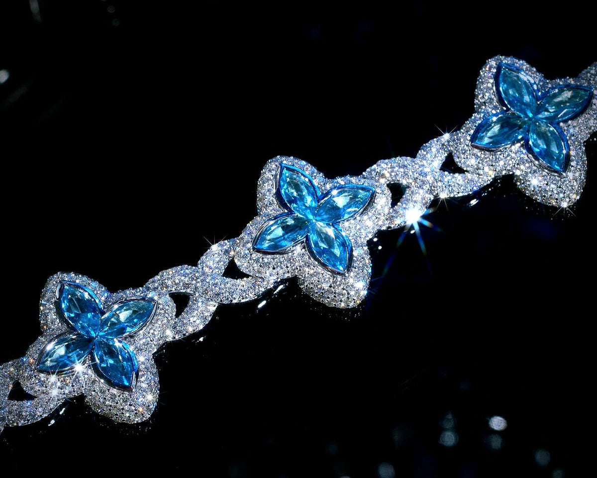 White Gold Clover Bracelet with Blue Marquise Gemstones and Pavé Diamonds