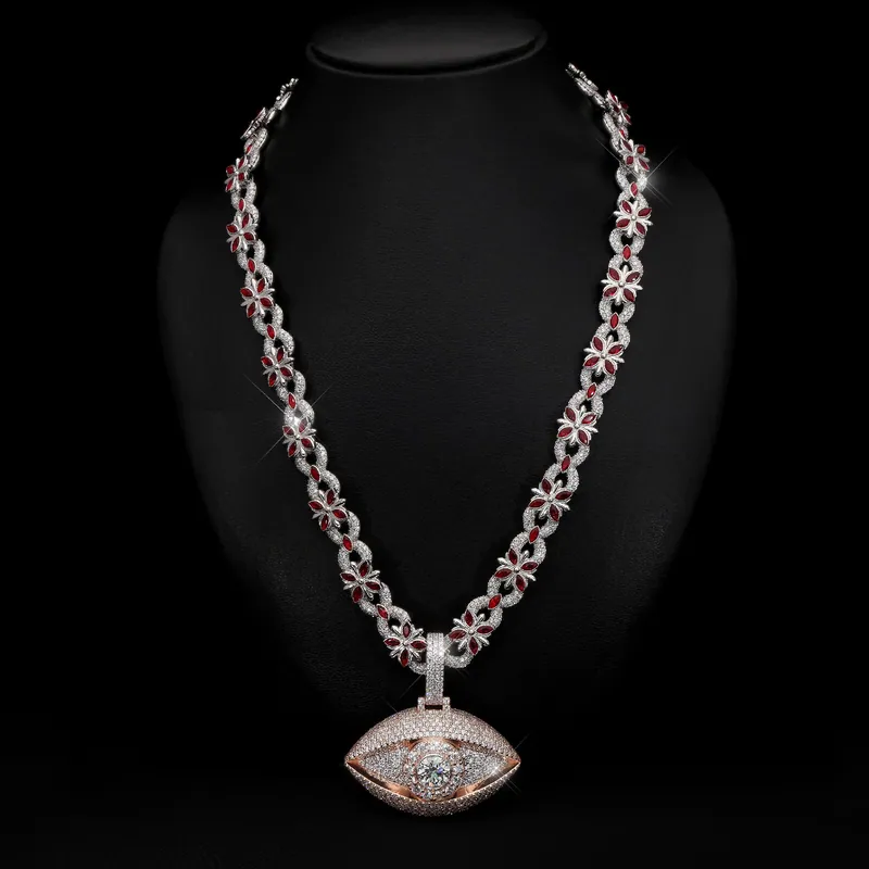 Stone-set evil eye pendant on a chain with red flower links