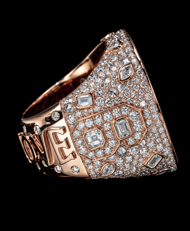 Side of the G ring with pavé and raised lettering