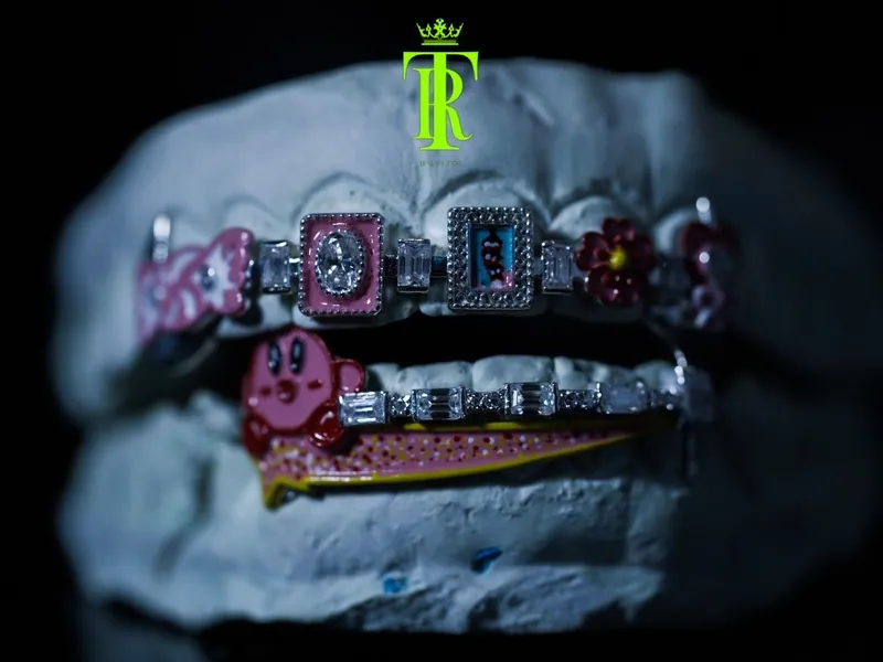 Character grillz set on a dental cast, alternate angle