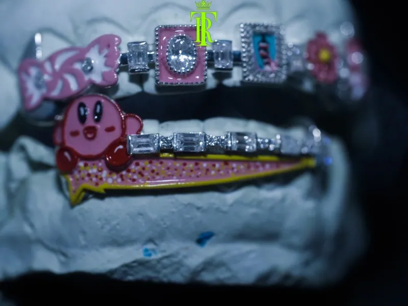 Colorful character grillz set on a dental cast, close-up