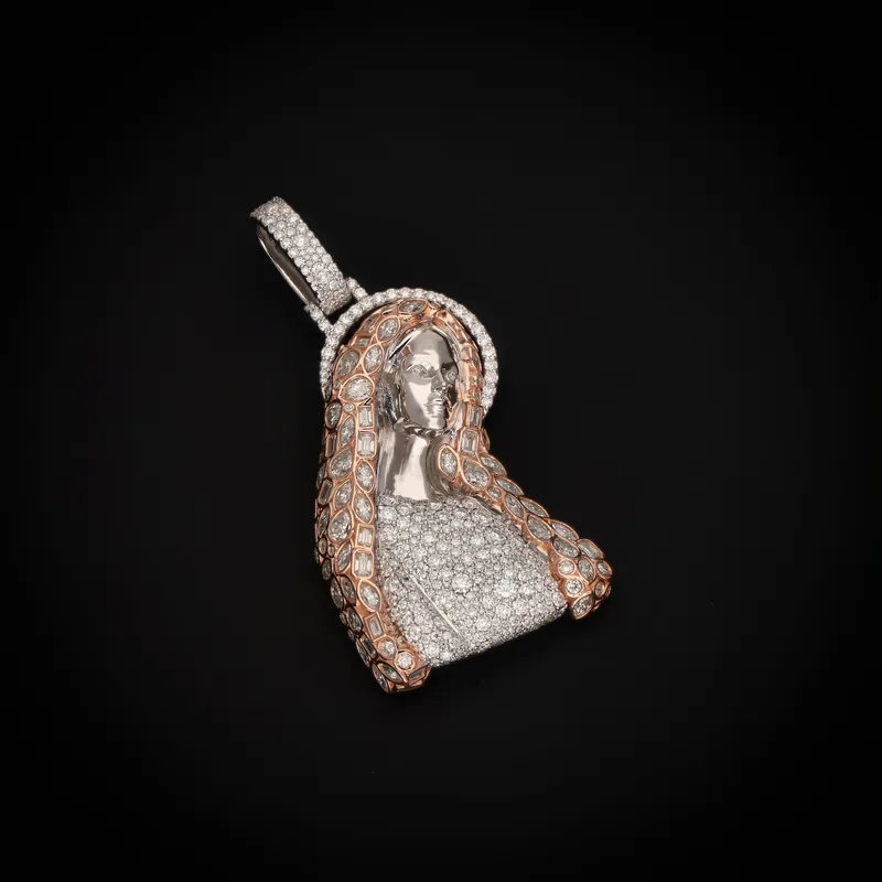 Madonna pendant with a polished rose-tone face and stone-set veil