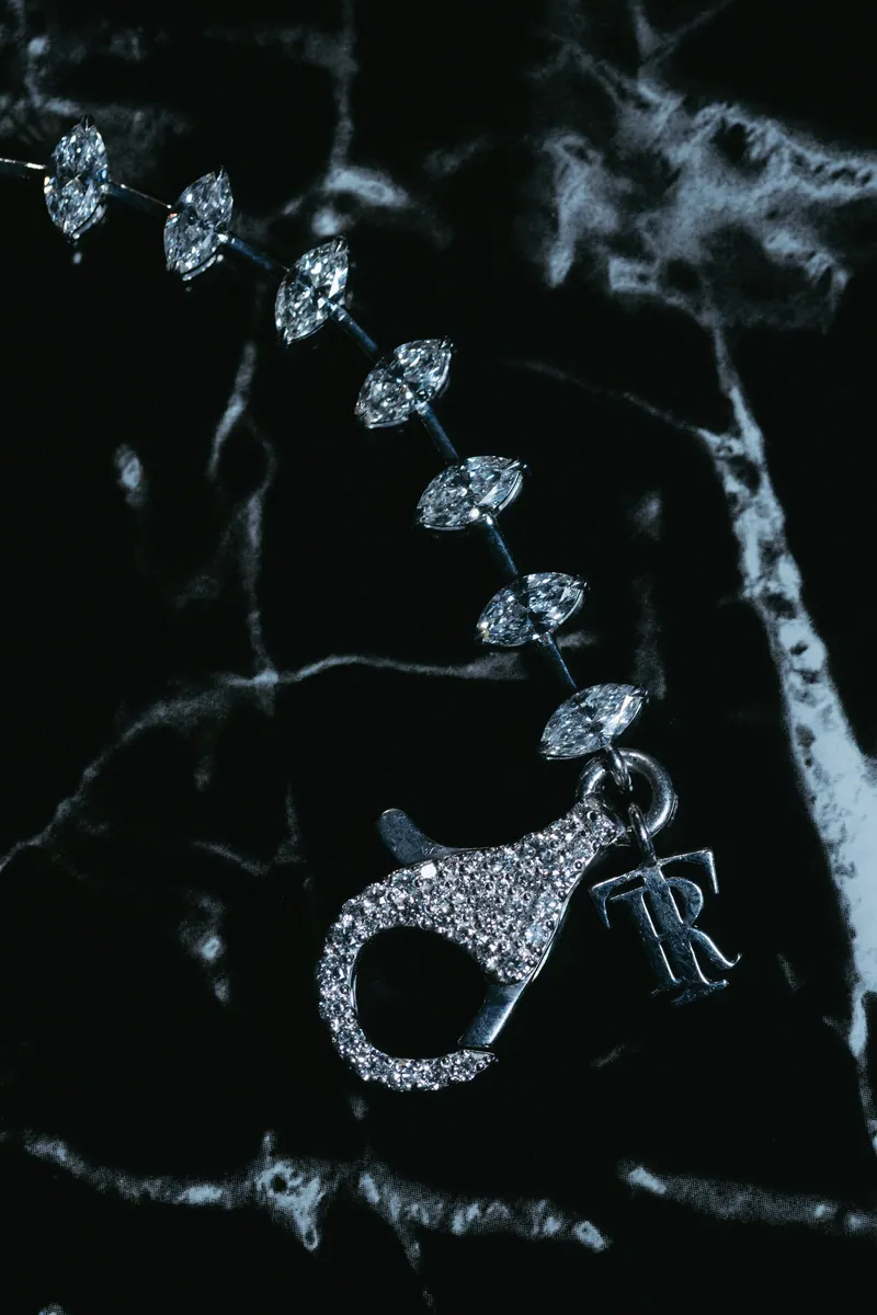 Pavé lobster clasp with a Royal T tag on the marquise chain