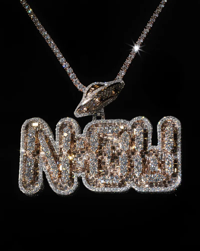 Stone-set lettering pendant with a planet bail, on a stone-set chain