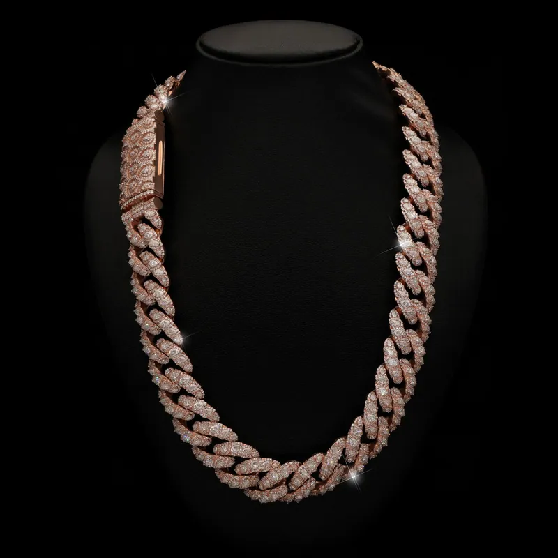 Rose-tone stone-set Cuban link chain on a black bust
