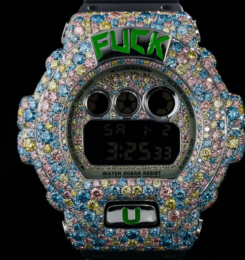 Digital watch fully set with pink, blue, and yellow stones