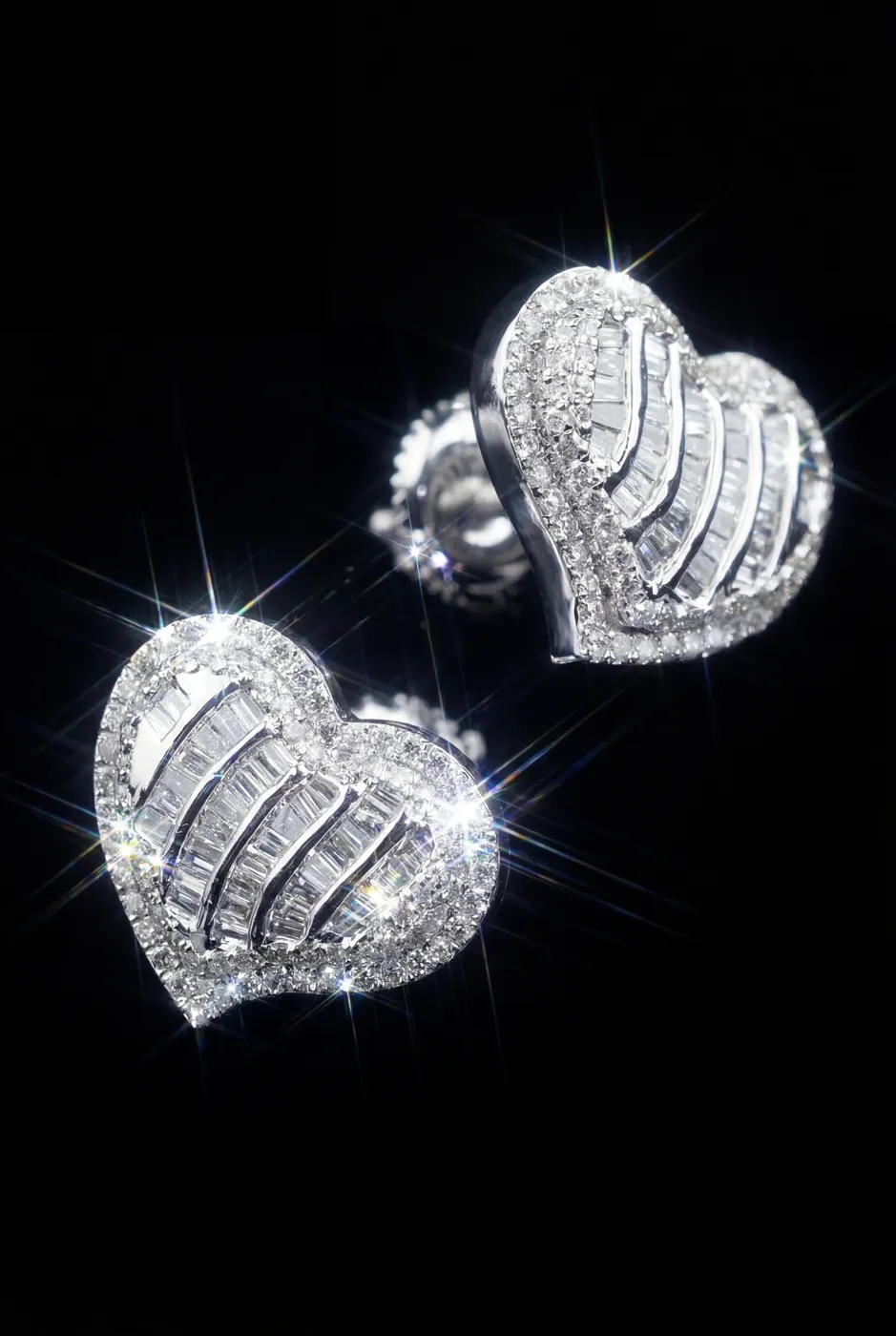 Pair of heart-shaped diamond stud earrings